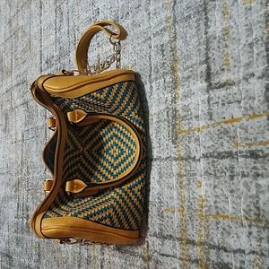 Yellow and teal weave pattern faux leather purse